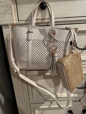 Anne Klein Cream Perforated Tote with Gold Tassel Charm and Woven Pouch